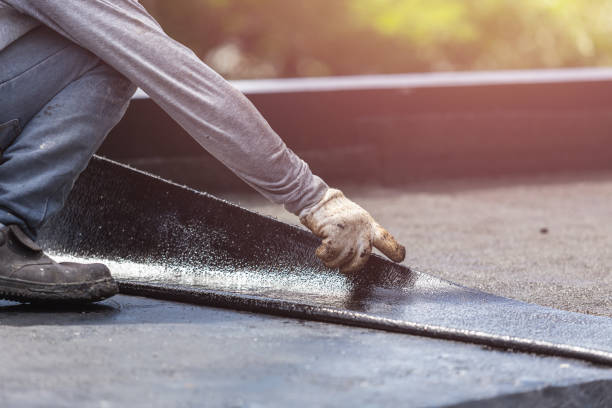 Professional Basement Waterproofing technician working in Northfield, KY